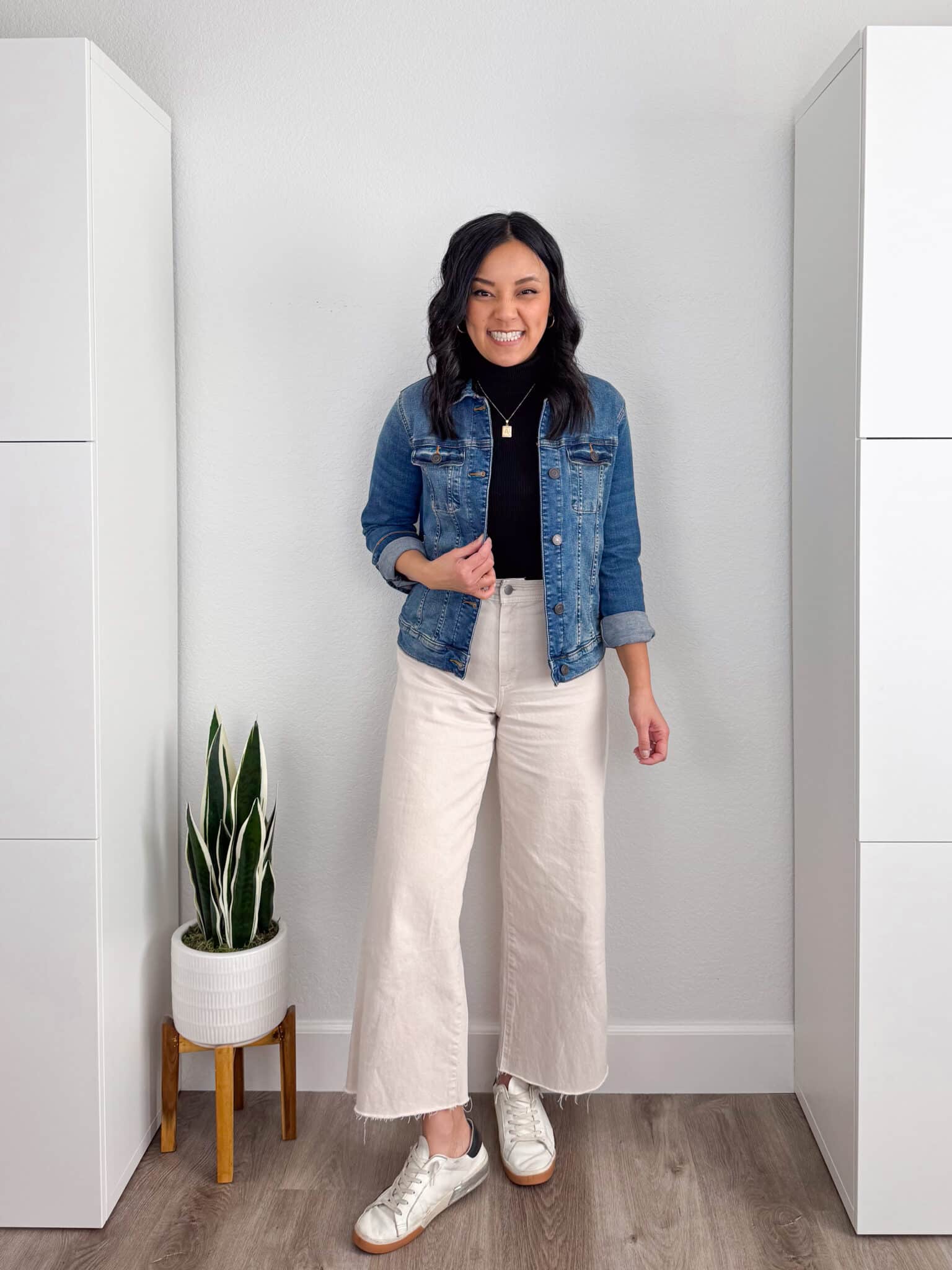 black shirt + cream wide leg jeans + denim jacket + putting me together + spring outfits with a denim jacket