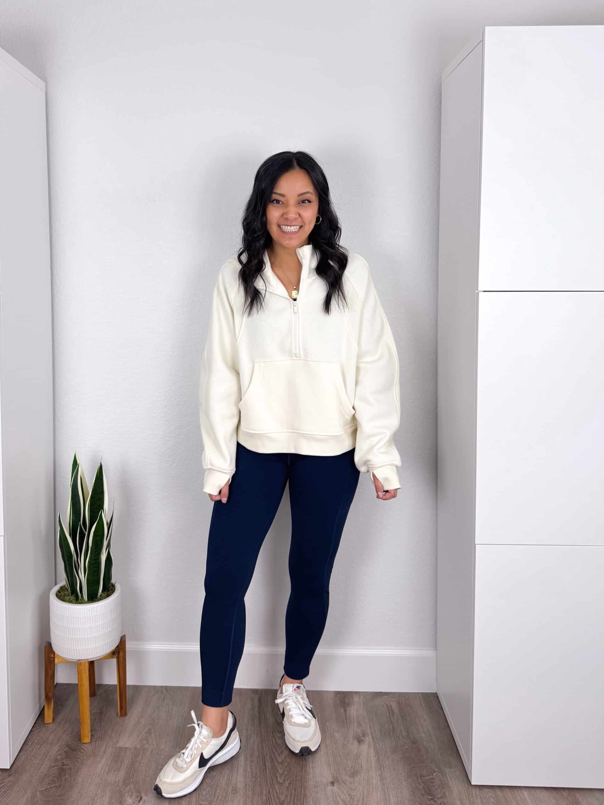 ivory sweatshirt + navy blue leggings + white sneakers + gold necklace + gold earrings white sweatshirt + navy blue leggings + white sneakers + gold necklace + gold earrings