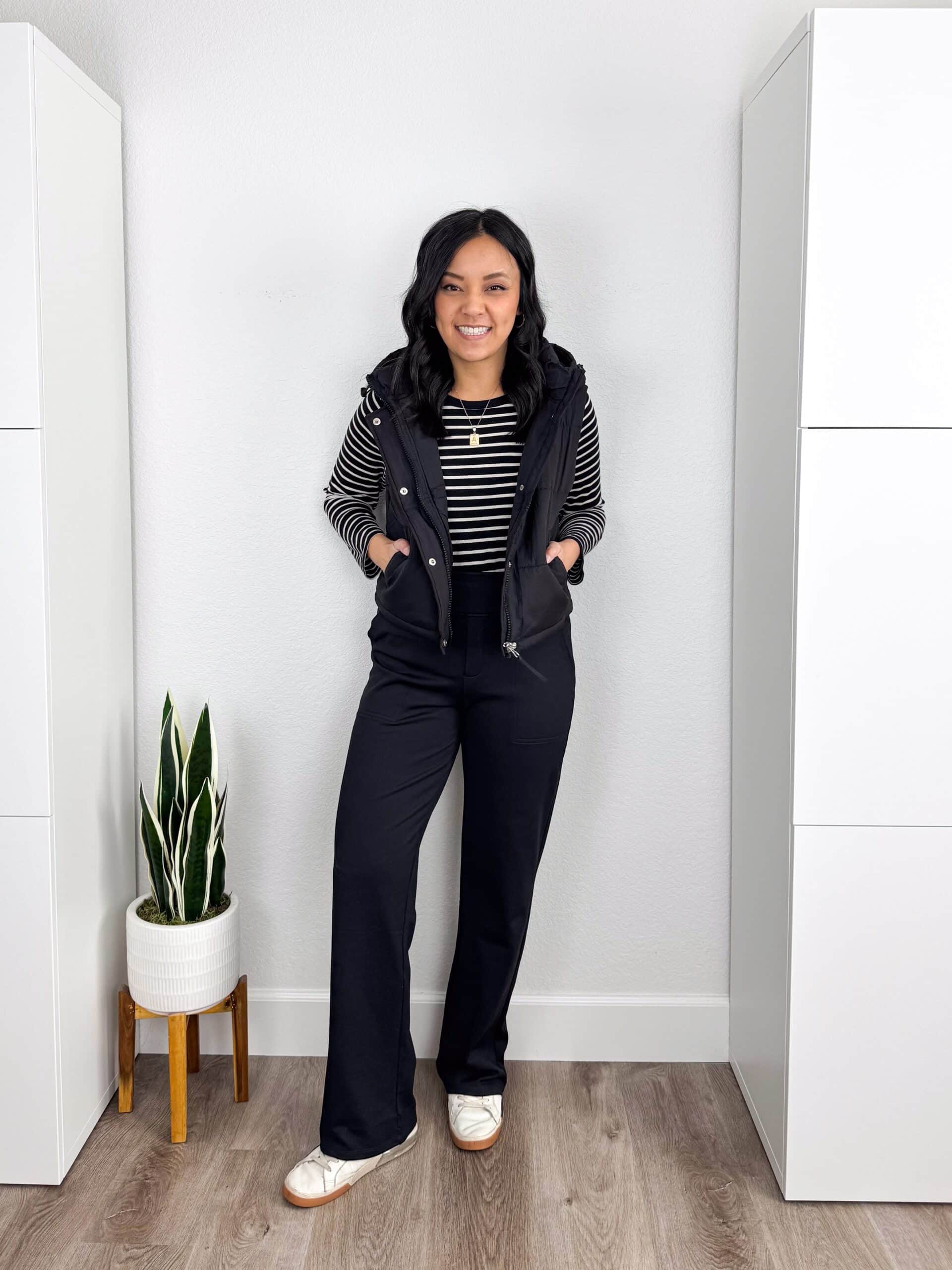 black and white striped long sleeve shirt + black vest + black wide leg fleece lined yoga pants + white sneakers + gold jewelry black and white striped tee + black vest + black wide leg fleece lined pants + white sneakers + gold jewelry