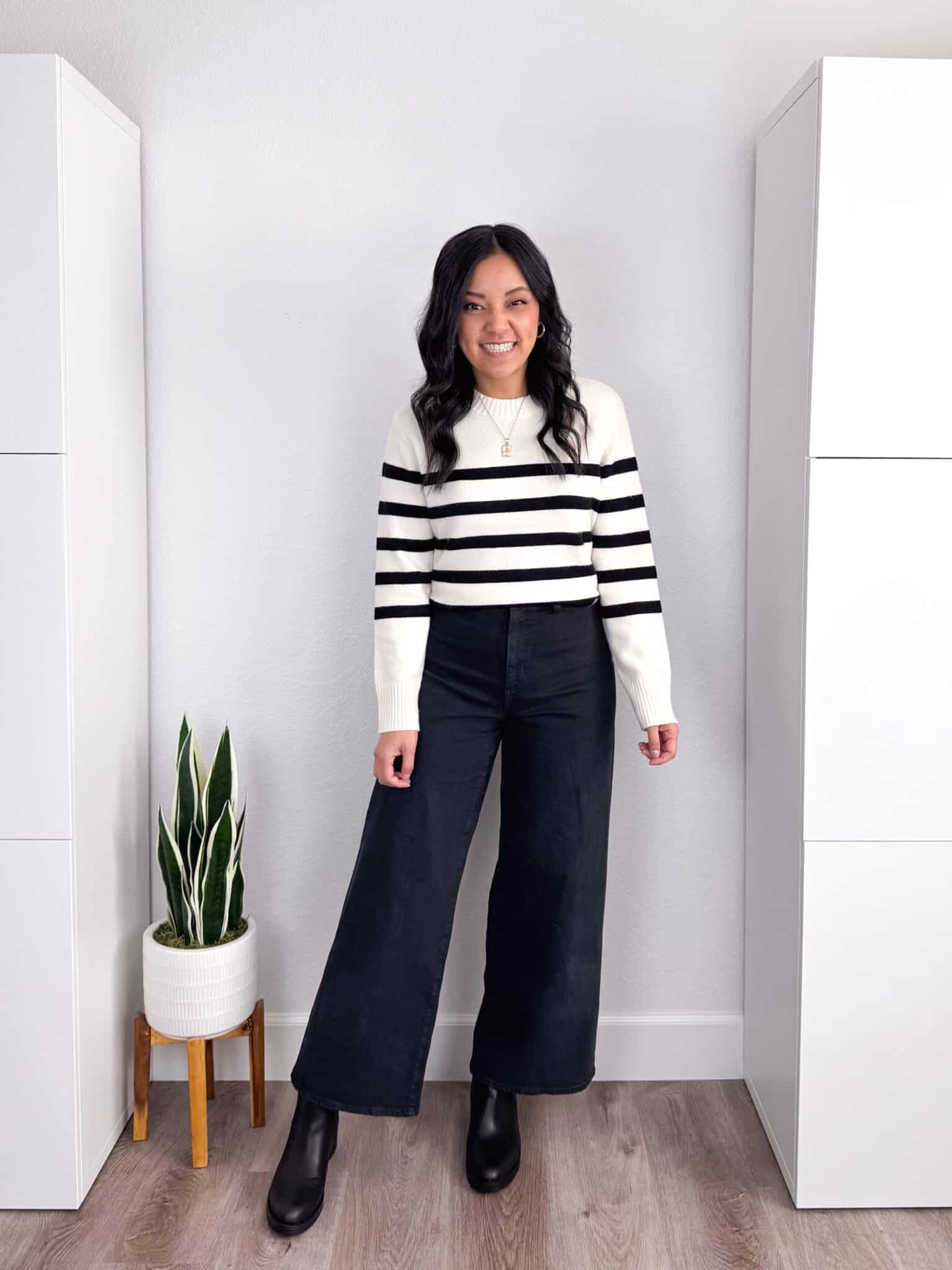 What Shoes to Wear With Wide Leg Jeans: How to Choose Shoes + Outfit Examples + what shoes to wear with wide leg jeans + putting me together + white and black striped sweater + dark wide leg jeans + affordable black almond toe boots