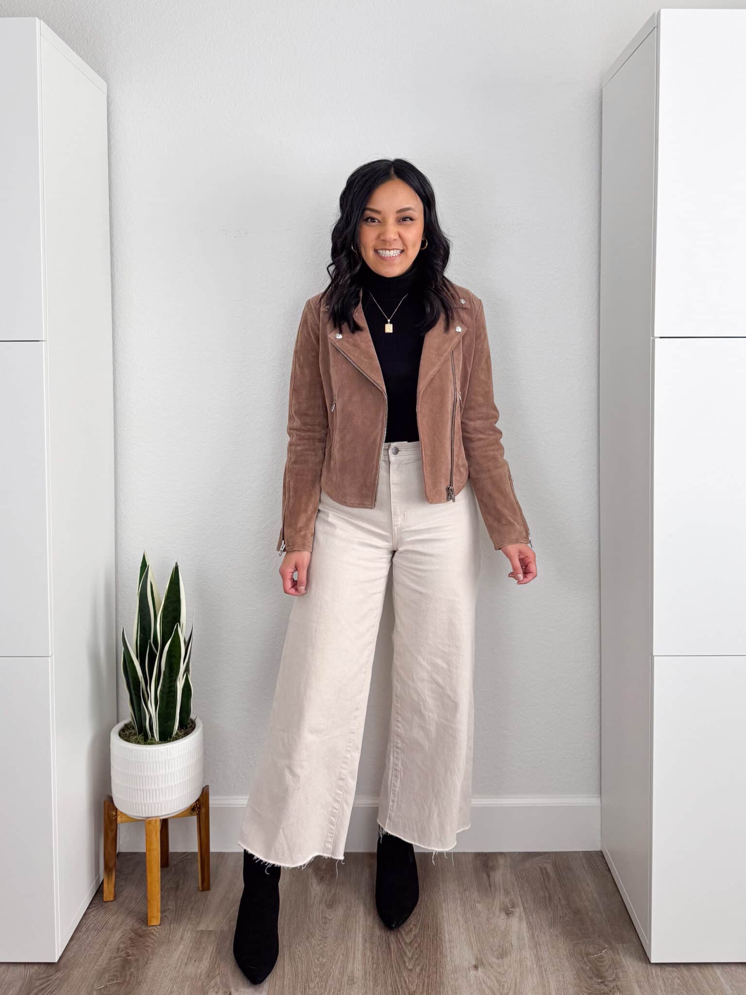 What Shoes to Wear With Wide Leg Jeans: How to Choose Shoes + Outfit Examples + what shoes to wear with wide leg jeans + putting me together + tan suede jacket + black turtleneck + white wide leg jeans + black pointed toe boots