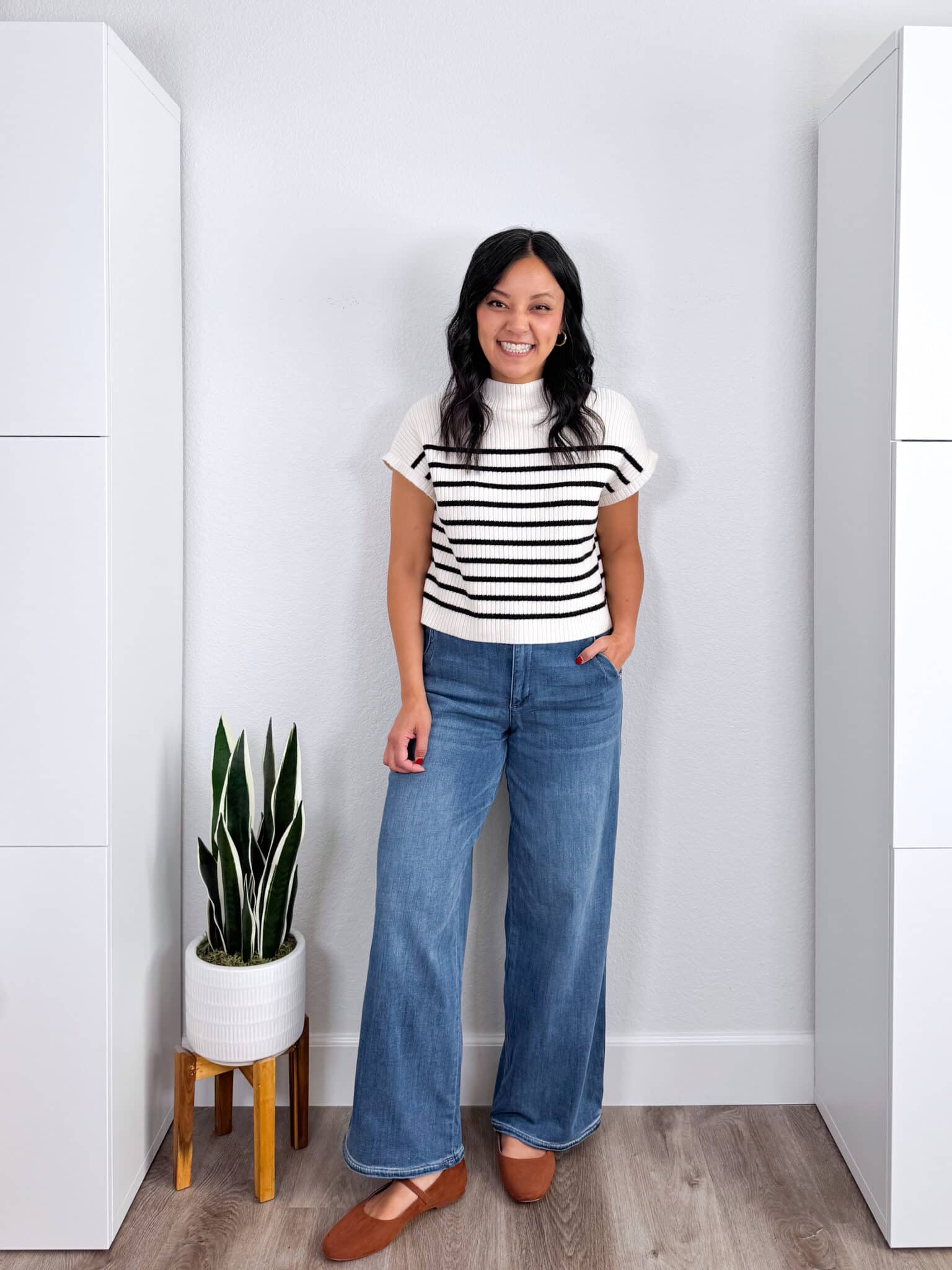 11 Wardrobe Essentials for Women Over 40 The Key Pieces That Make Looking Polished Easy + wardrobe essentials for women over 40 + putting me together + short sleeve striped sweater + comfortable jeans + tan flats
