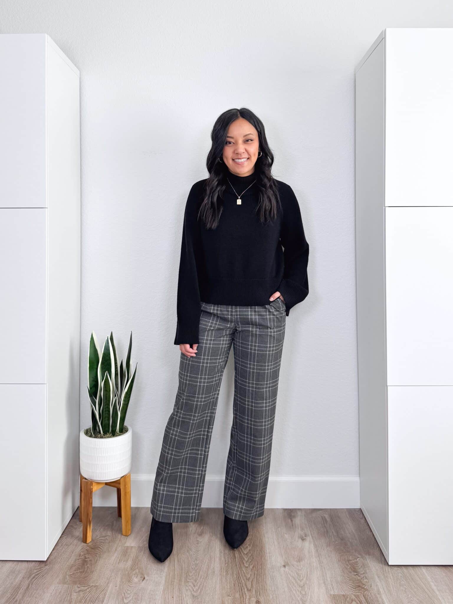 black sweater outfit ideas + putting me together + 10 Black Sweater Outfit Ideas You Can Easily Copy for Winter + versatile black sweater + gray and black plaid pants + black kitten heel boots