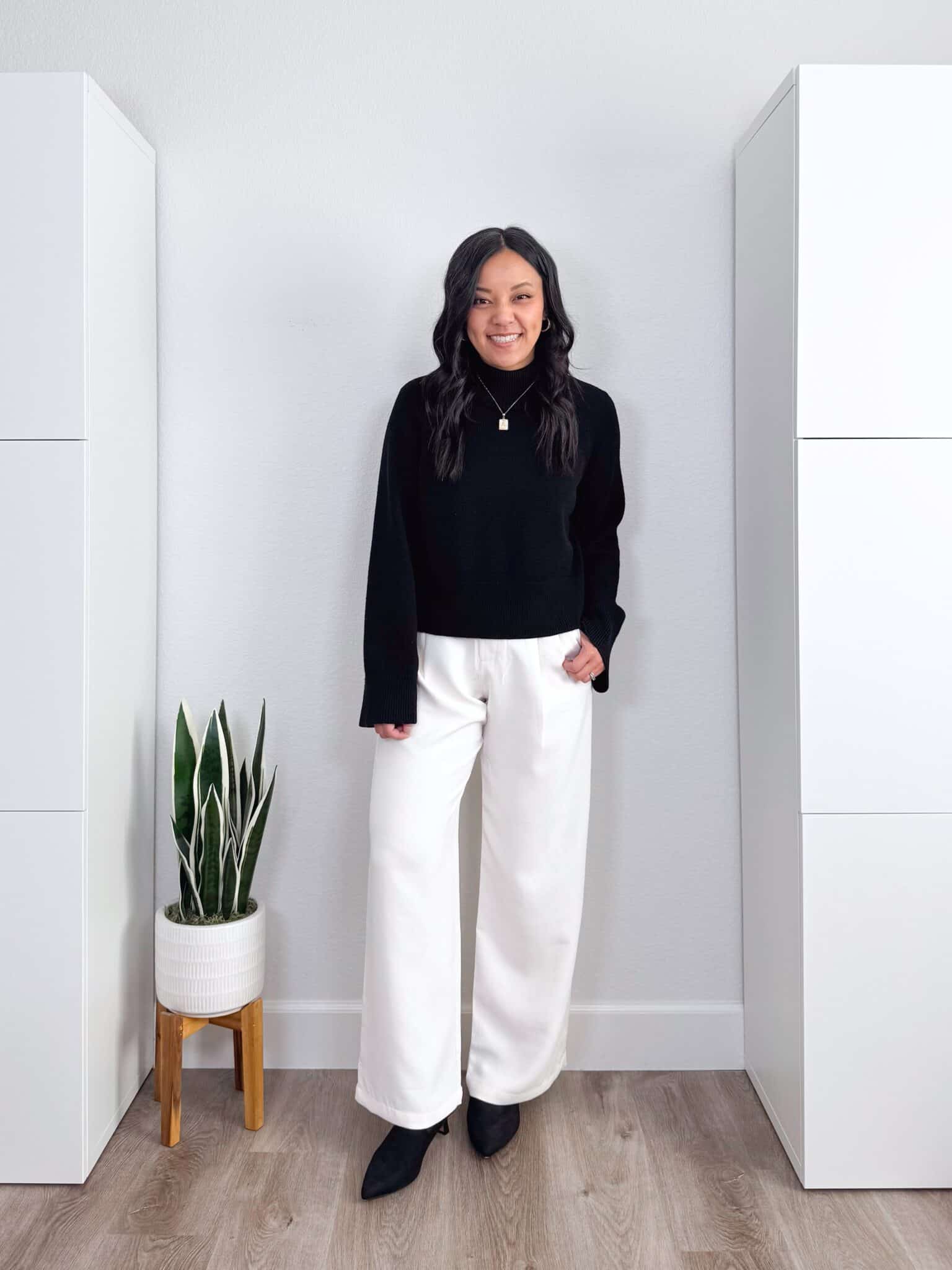 black sweater outfit ideas + putting me together + 10 Black Sweater Outfit Ideas You Can Easily Copy for Winter + versatile black sweater + casual white trousers + black kitten heel boots