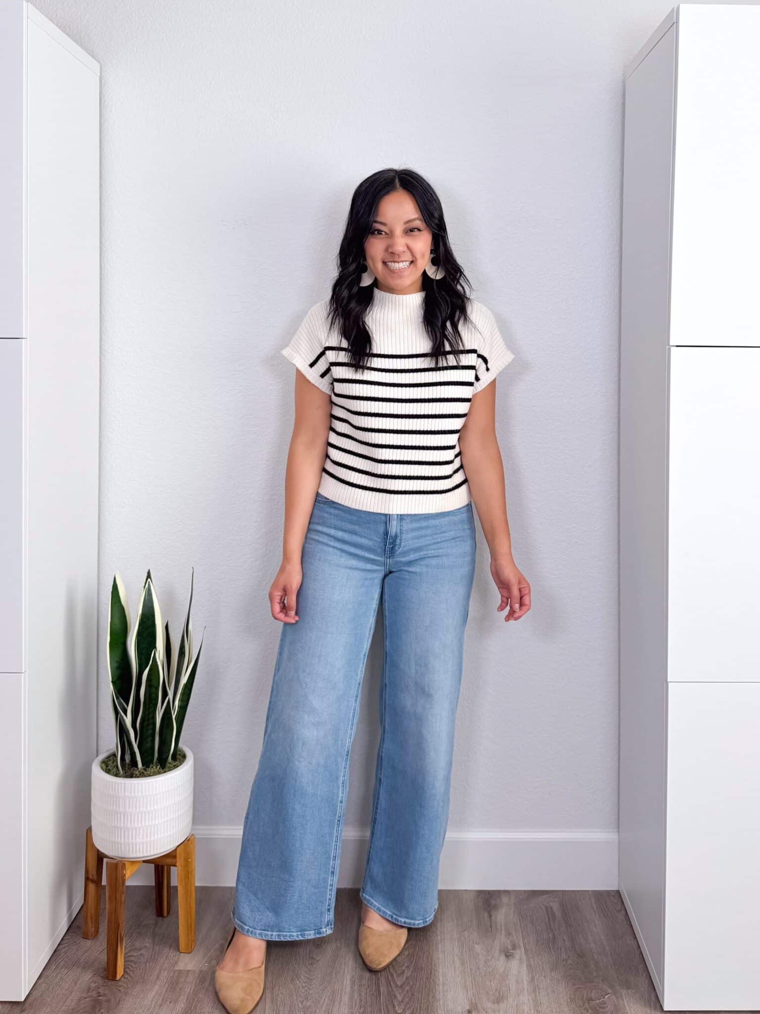 11 Spring Sweaters You Don't Have to Tuck + putting me together + sweaters you don't have to tuck + no tuck sweaters + mock neck black and white striped short sleeve sweater + comfortable wide leg jeans + tan flats