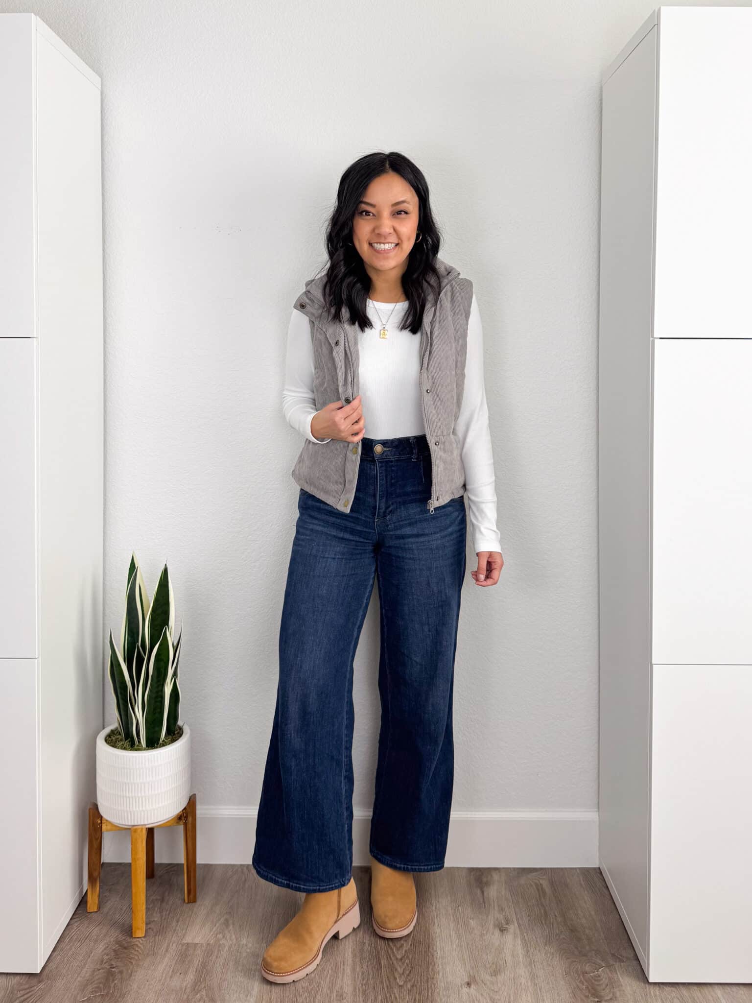 7 Tips & Winter Clothes That Actually Keep You Warm + putting me together + warm winter clothes + long sleeve white t shirt + comfortable wide leg jeans + gray corduroy vest + tan lug sole boots