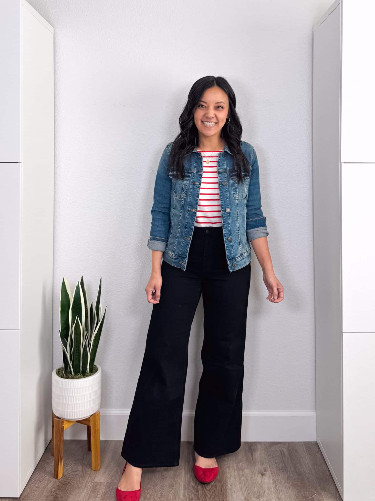 how to style a red and white striped t-shirt + putting me together + How to Style a Red and White Striped T-Shirt: 8 Outfits to Copy + versatile red and white striped tee + black jeans + easy to wear denim jacket + red flats