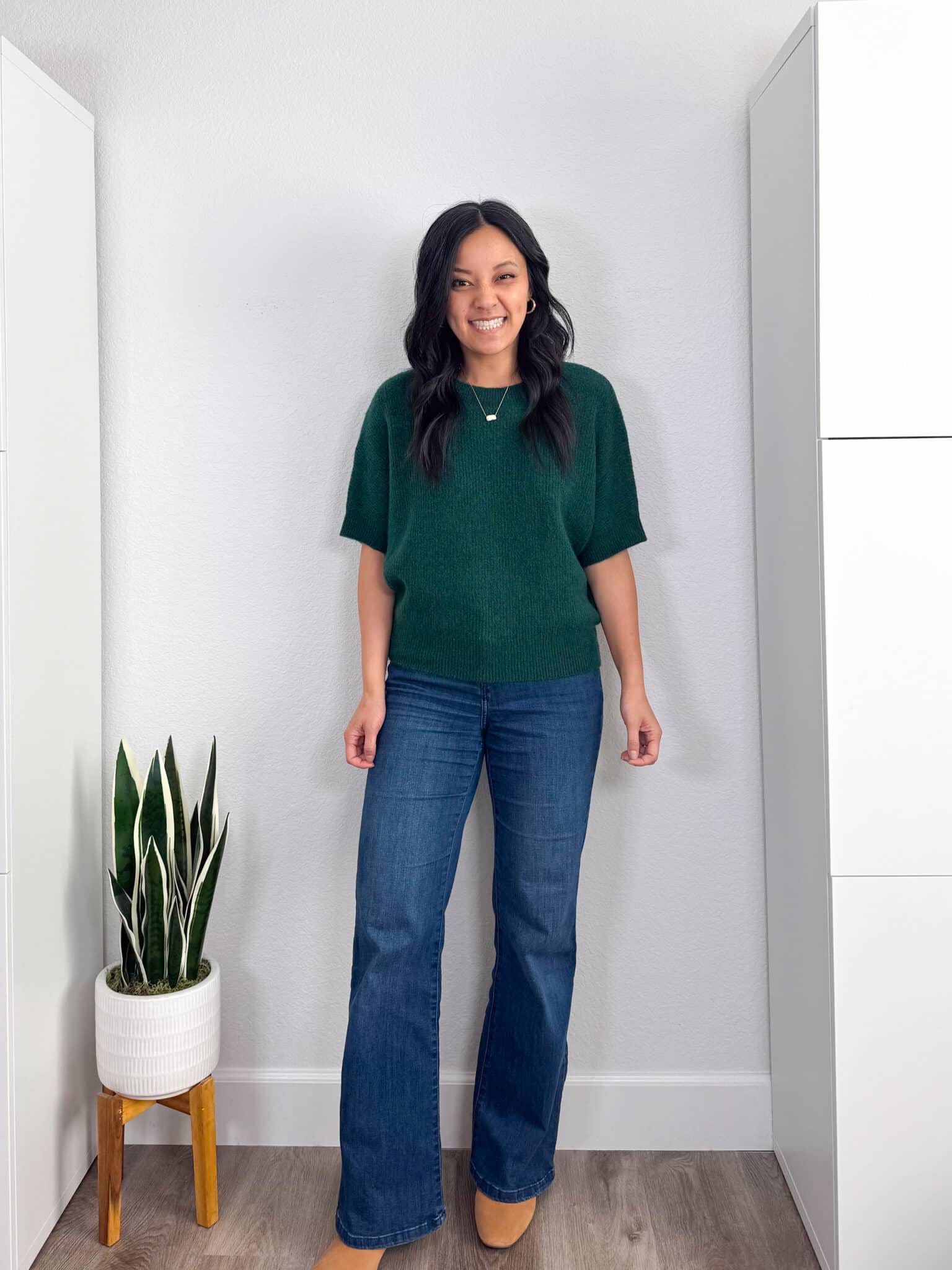 11 Spring Sweaters You Don't Have to Tuck + putting me together + sweaters you don't have to tuck + no tuck sweaters + green chic short sleeve dolman sweater + comfortable dark wash flare jeans + tan water resistant boots
