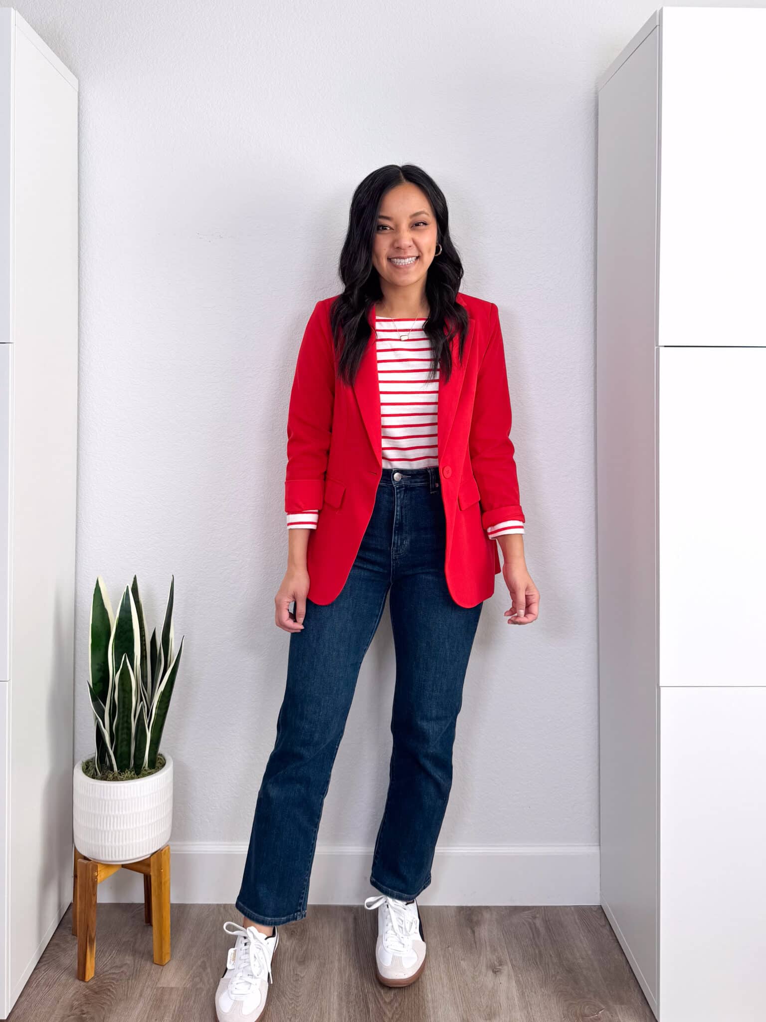 how to style a red and white striped t-shirt + putting me together + How to Style a Red and White Striped T-Shirt: 8 Outfits to Copy + versatile red and white striped tee + dark wash comfortable straight leg jeans + red blazer + white sneakers + white and black sneakers
