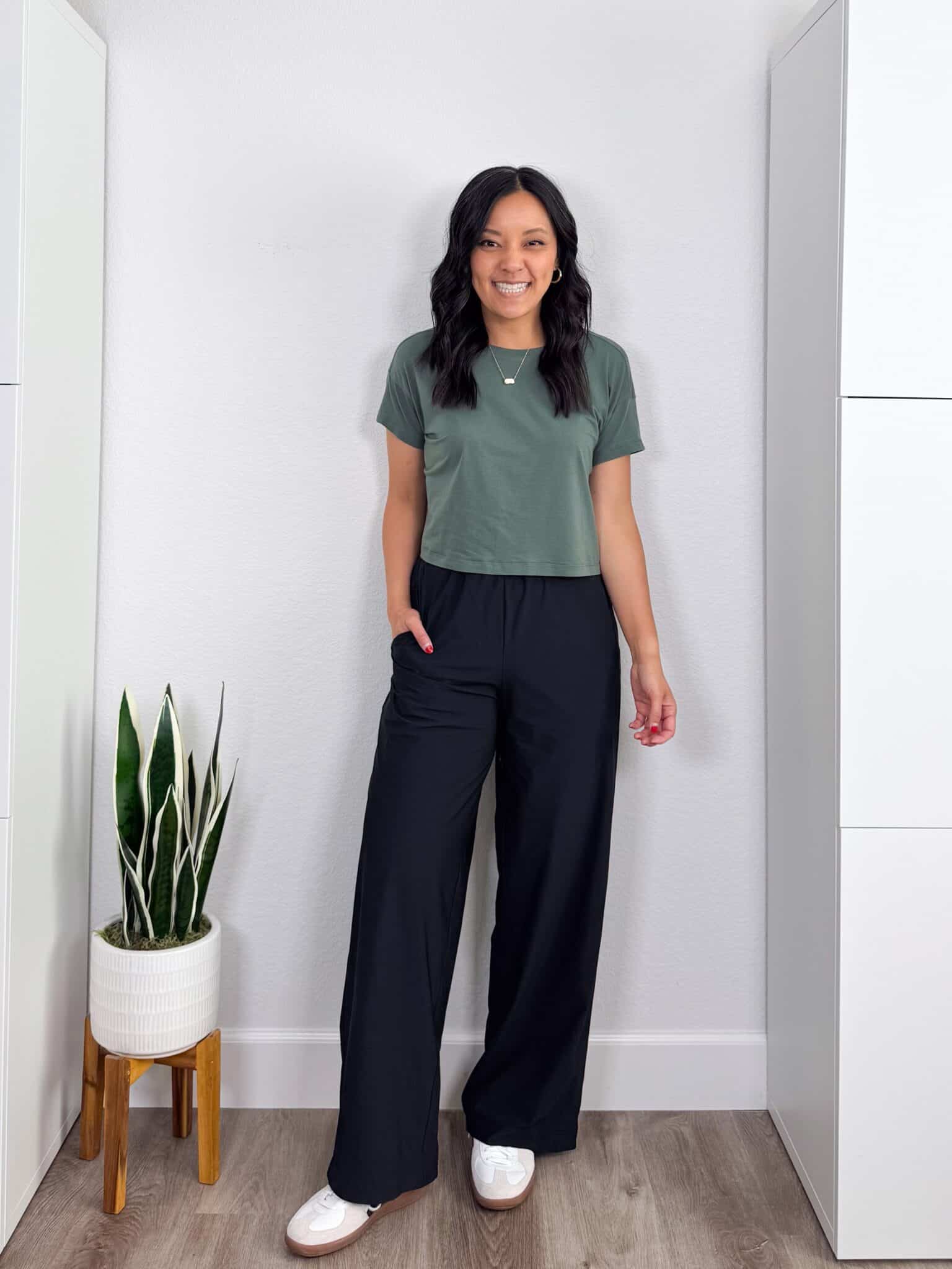 My BEST Pants Recommendations for Spring & Summer + best pants for spring & summer + My BEST Pants for Spring & Summer That You'll Want to Live In + putting me together + soft green athleisure top + easy wide leg athleisure pants + white sneakers