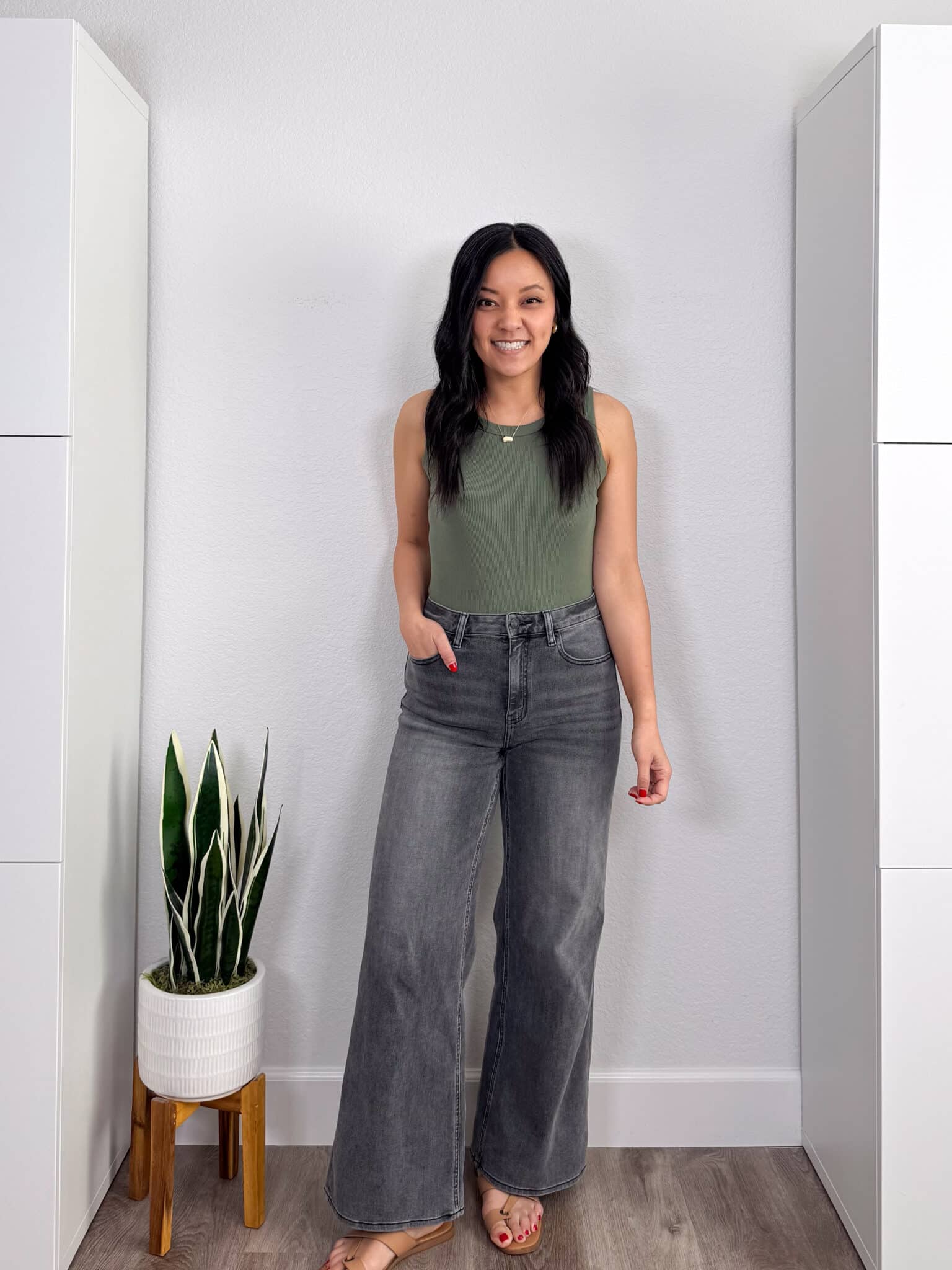 My BEST Pants Recommendations for Spring & Summer + best pants for spring & summer + My BEST Pants for Spring & Summer That You'll Want to Live In + putting me together + versatile olive green tank top + comfortable washed black wide leg jeans + tan sandals