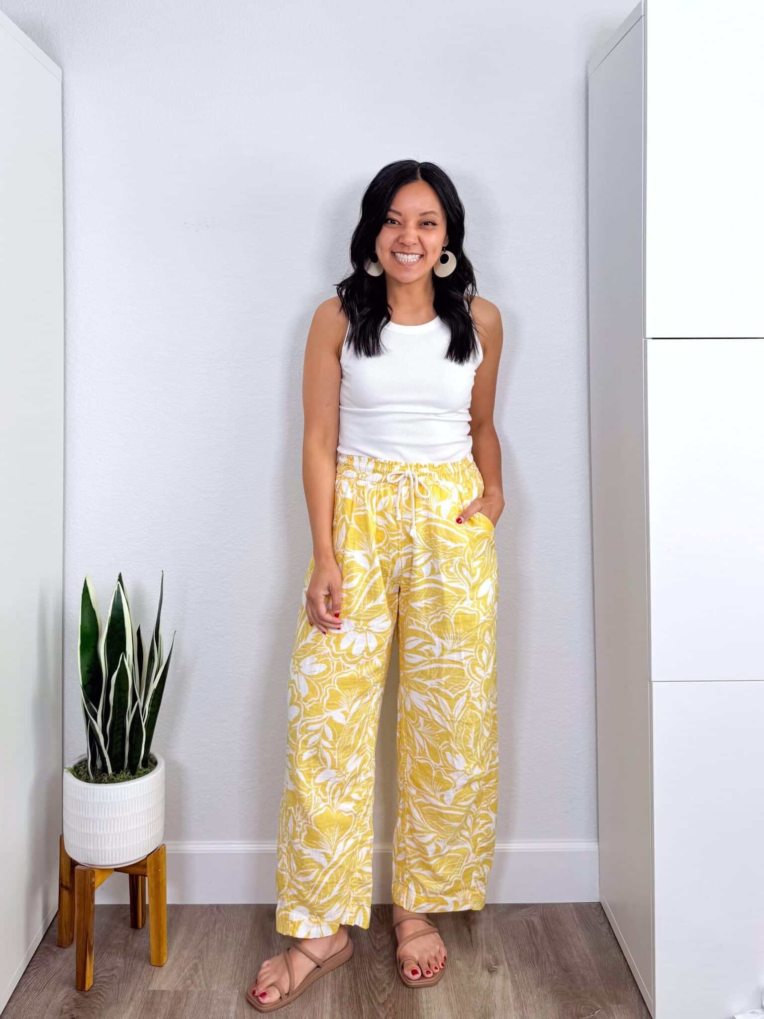 My BEST Pants Recommendations for Spring & Summer + best pants for spring & summer + My BEST Pants for Spring & Summer That You'll Want to Live In + putting me together + white tank top + gauzy yellow pants for summer + tan sandals + lightweight ivory  leather earrings