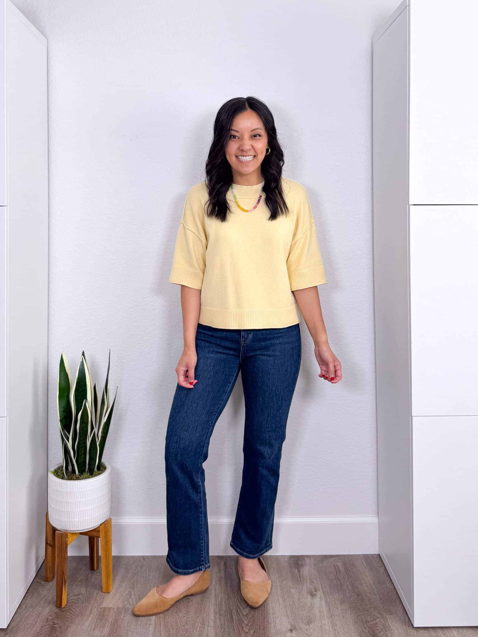What Color Goes With Butter Yellow? Easy Outfit Ideas + what color goes with butter yellow + putting me together + soft butter yellow short sleeve sweater + comfortable dark wash straight leg jeans + tan flats + gold hoop earrings + affordable colored beaded necklace