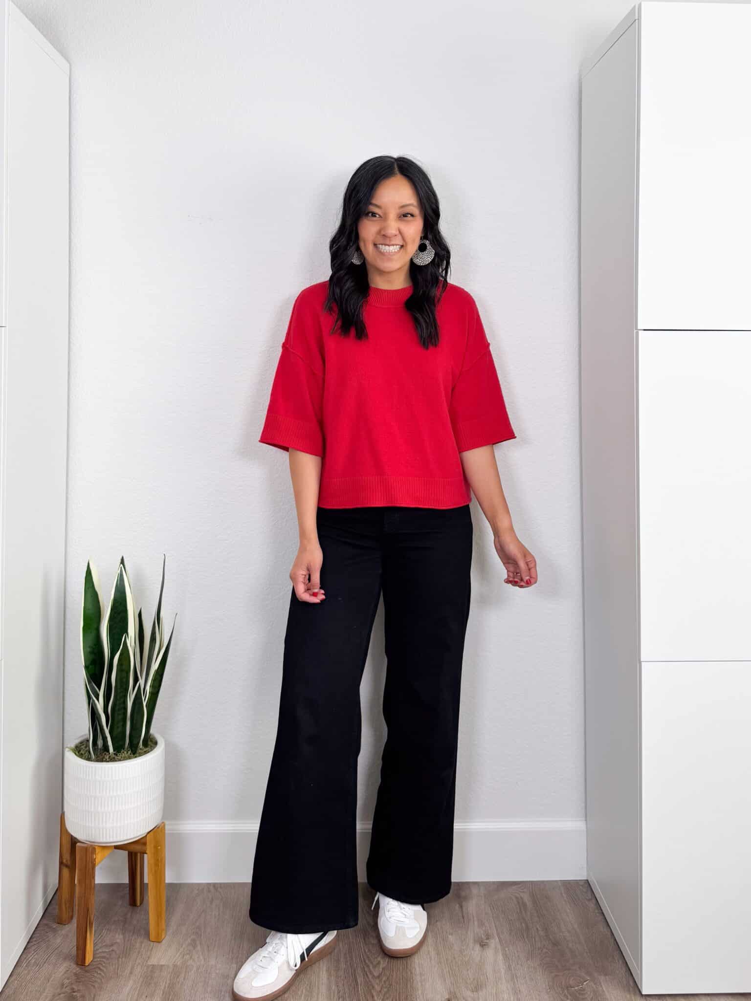  Spring Shoes for Easy Styling All Season Long + spring shoes for 2026 + shoes for spring + putting me together + athleisure outfit with black pants + soft short sleeve red sweater + comfortable black wide leg jeans + black and white lifestyle sneakers