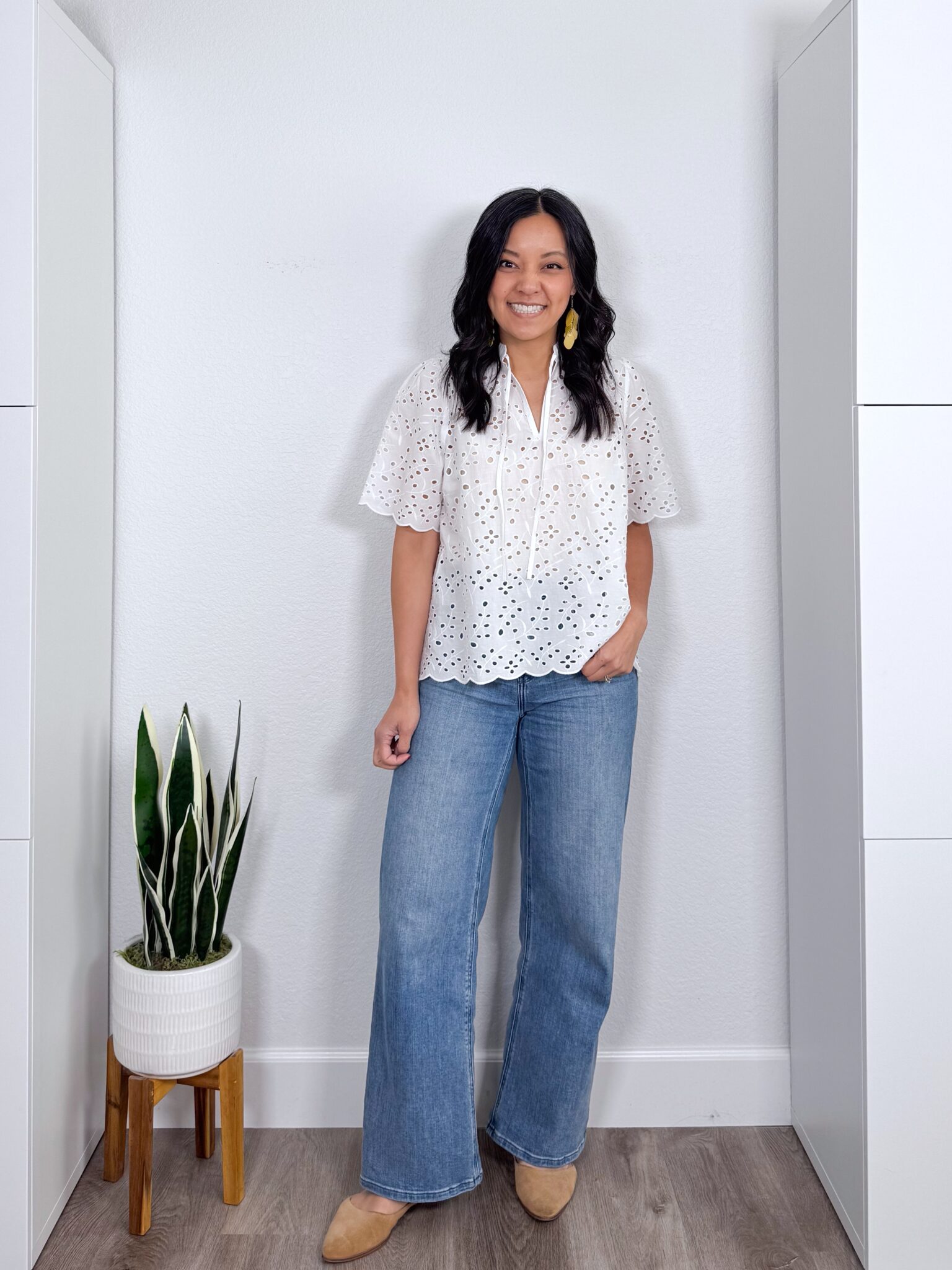 Elevated Casual Spring Tops That Make Getting Dressed Easier + elevated casual spring tops + putting me together + white eyelet lace shirt + easy to wear wide leg jeans + tan flats + lightweight yellow earrings