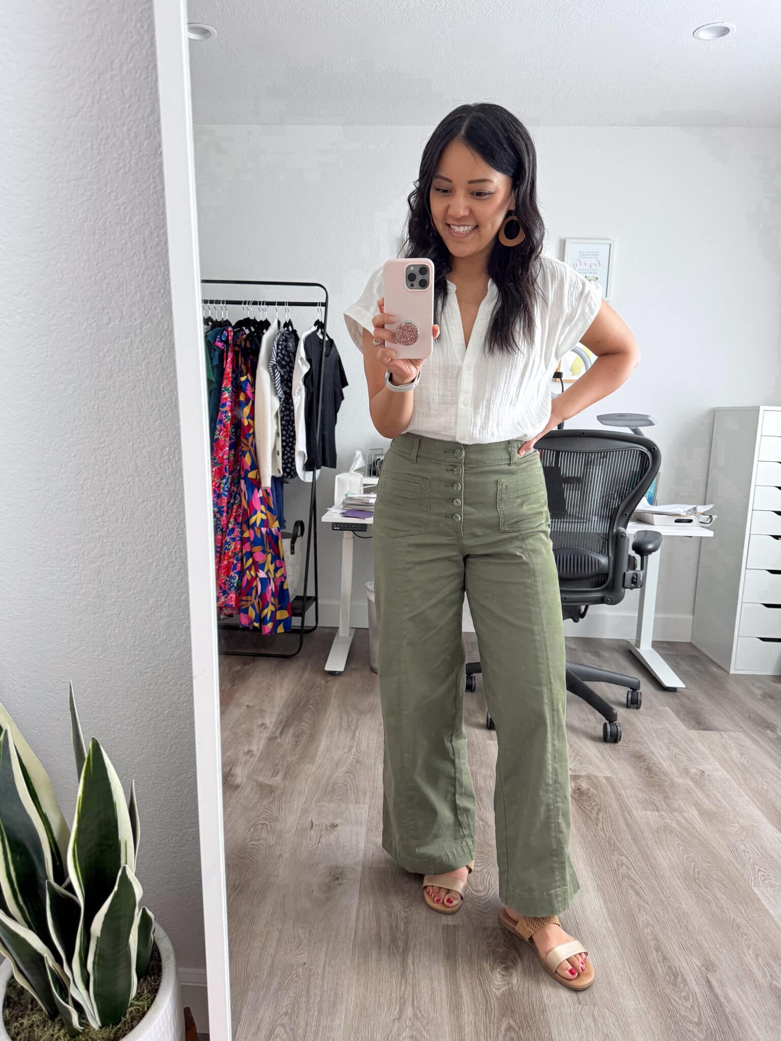 My BEST Pants Recommendations for Spring & Summer + best pants for spring & summer + My BEST Pants for Spring & Summer That You'll Want to Live In + putting me together + versatile white linen button up + olive green comfortable wide leg jeans + metallic gold and tan sandals + tan lightweight earrings 