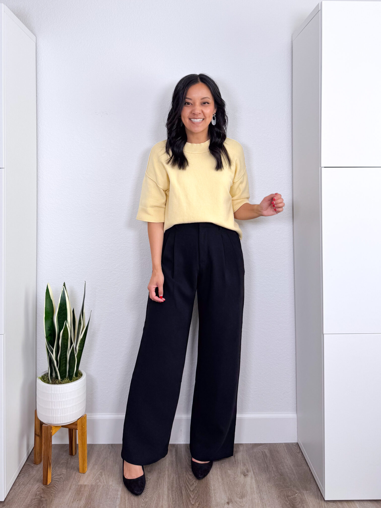 What Color Goes With Butter Yellow? Easy Outfit Ideas + what color goes with butter yellow + putting me together + soft butter yellow short sleeve sweater + comfortable black wide leg pants + black heels + animal print earrings
