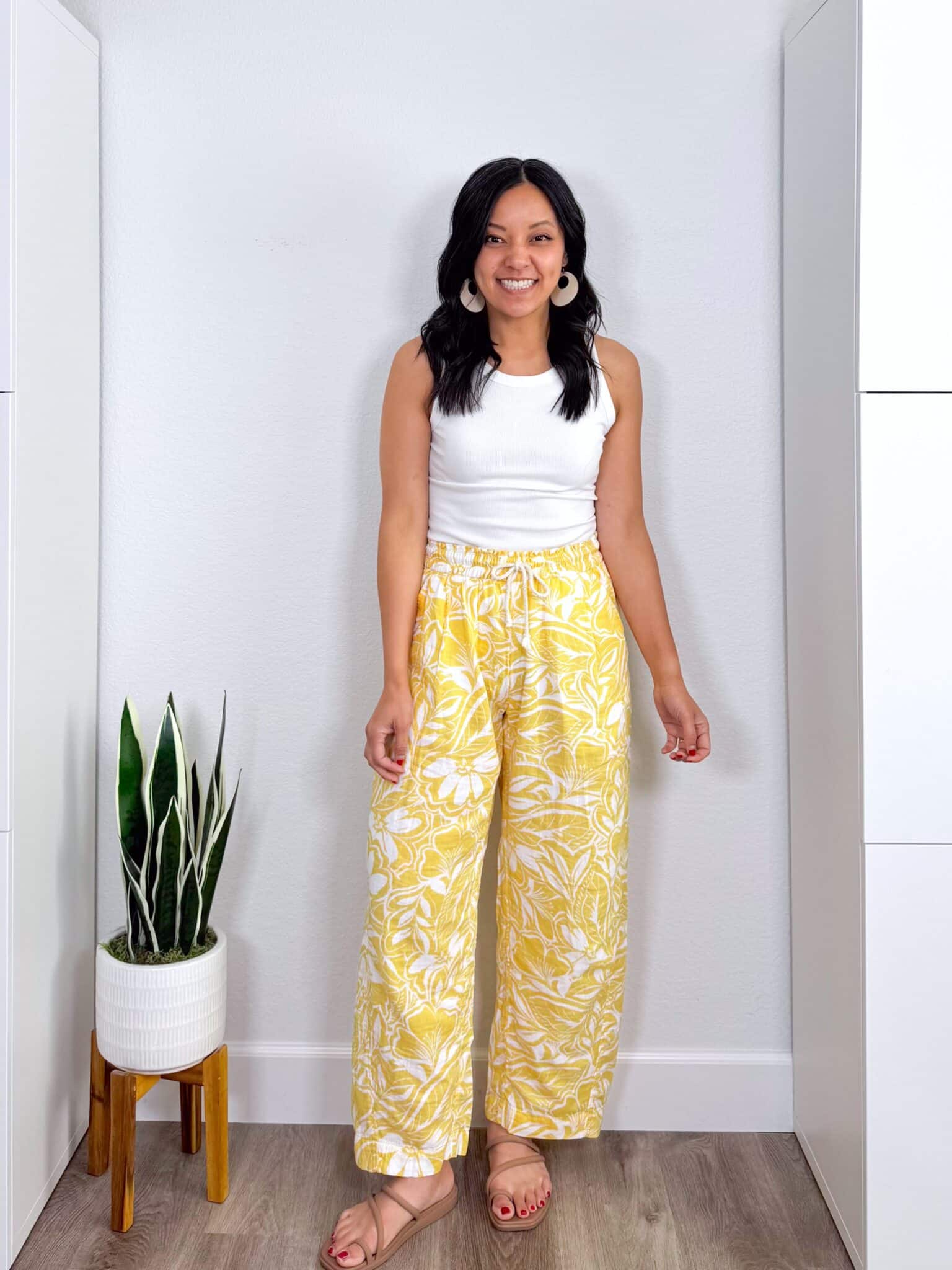 The Best Summer Trends for 2026 That Are Actually Wearable + putting me together + summer trends 2026 + versatile white tank top + lightweight yellow and white linen pants + comfortable tan sandals + tan earrings