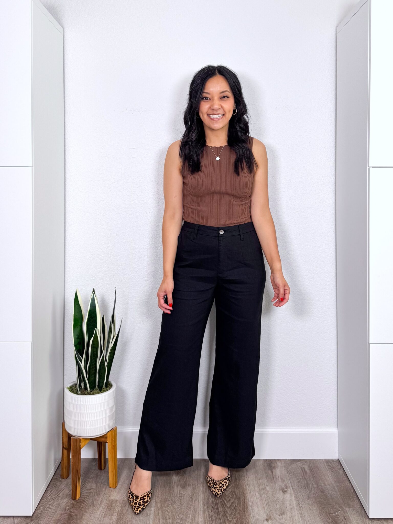 What to Wear With Black Linen Pants: 14 Outfit Ideas for Summer You Can Easily Copy + black linen pants outfit + putting me together + burgundy top + elevated black wide leg linen pants for work + leopard print heels + gold hoops + black necklace