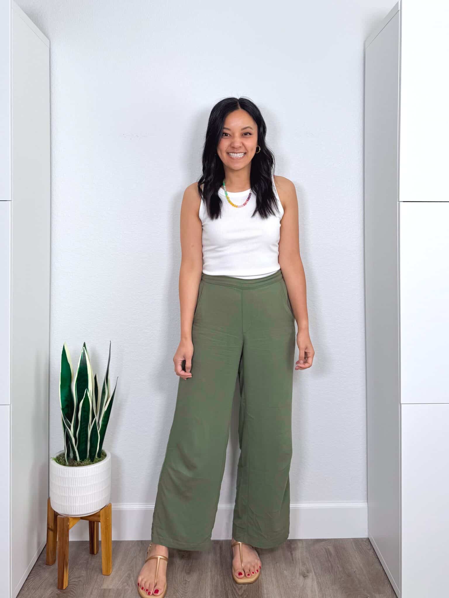 The Best Summer Trends for 2026 That Are Actually Wearable + putting me together + summer trends 2026 + versatile white tank top + lightweight olive green pants + gold metallic water friendly sandals + colorful beaded necklace