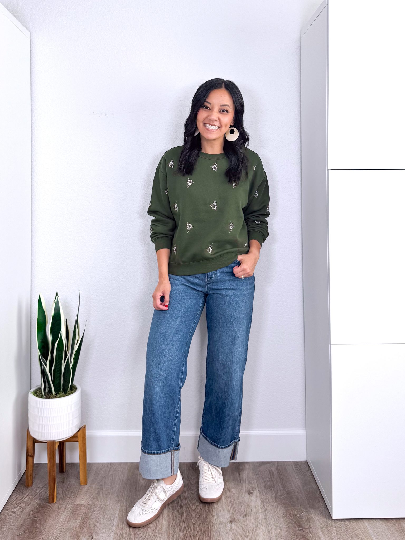 REVIEWS: Fall Jackets, Really Affordable Elevated Casual Tops, and Shoes + elevated casual tops and fall jackets + putting me together + soft olive green floral printed graphic sweatshirt + straight leg cuffed jeans + perforated white sneakers