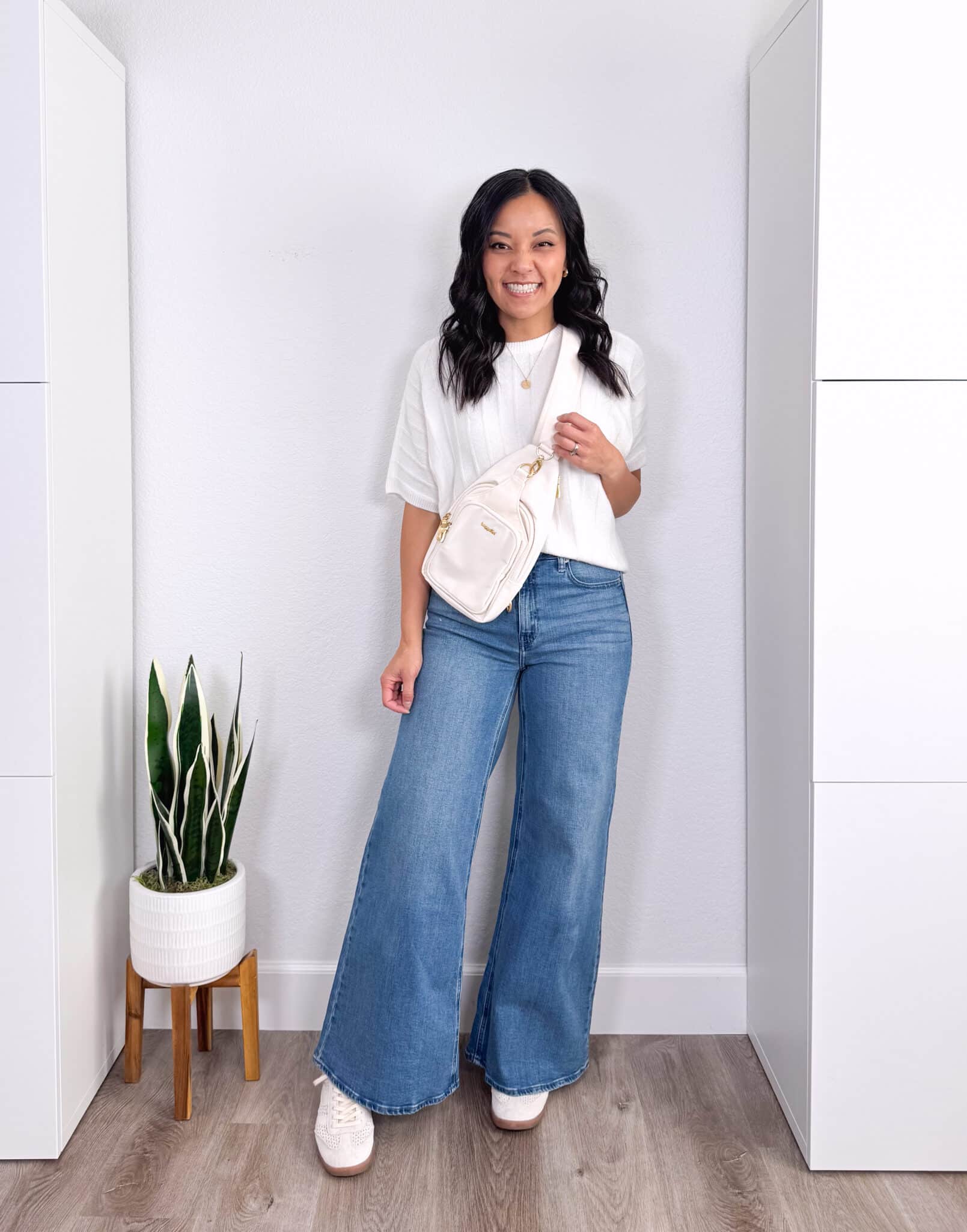 REVIEWS: Fall Jackets, Really Affordable Elevated Casual Tops, and Shoes + elevated casual tops and fall jackets + putting me together + white short sleeve sweater + medium wash wide leg jeans + white perforated sneakers + gold icon necklace + gold and white sling bag + baggalini bag